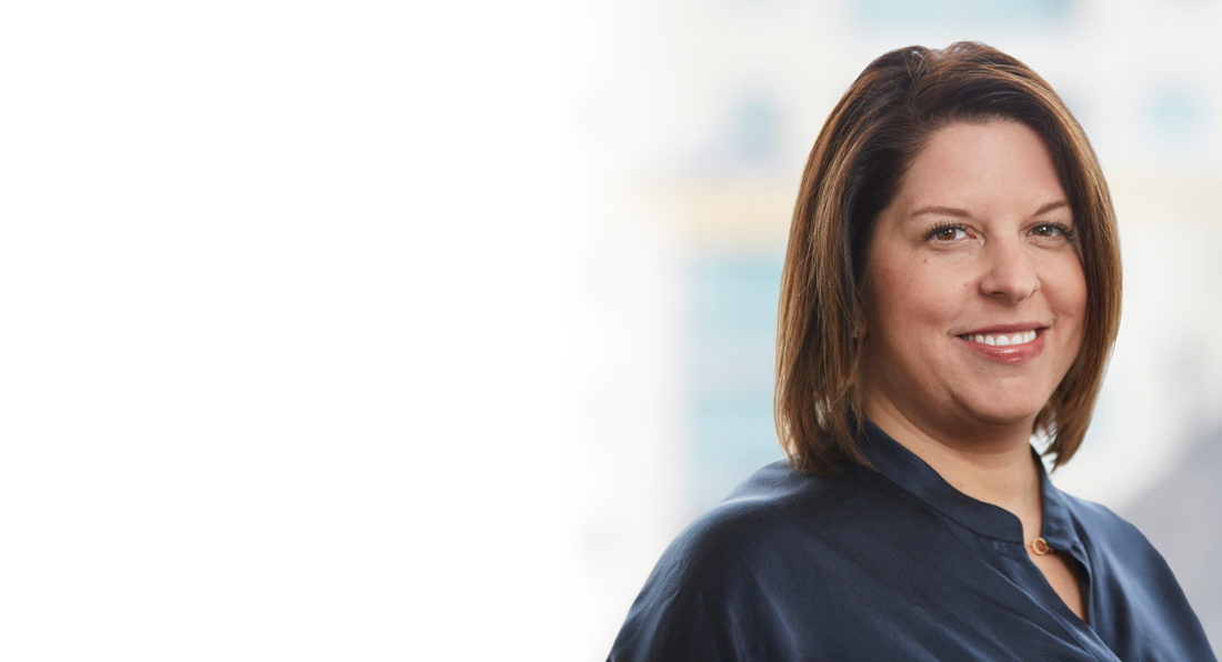 Headshot of Social Solutions CEO Kristin Nimsger