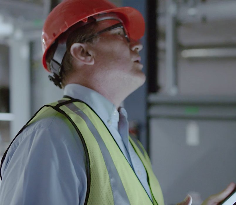 Image of on-site worker in a hard hat