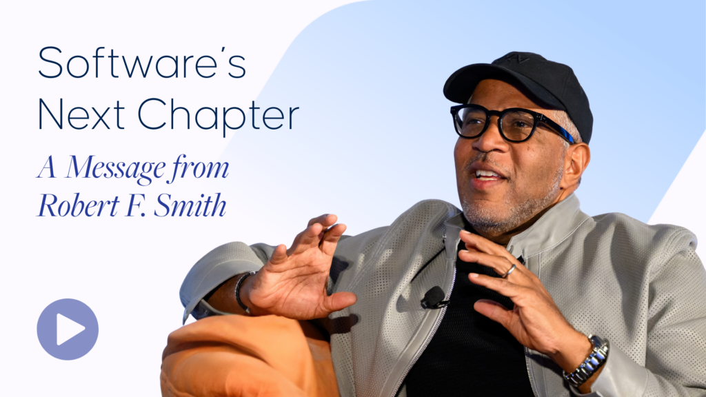 Robert F. Smith, wearing a gray jacket and black cap, speaks and gestures. Text overlay reads: 'Software's Next Chapter, A Message from Robert F. Smith.' A play button icon is in the corner.